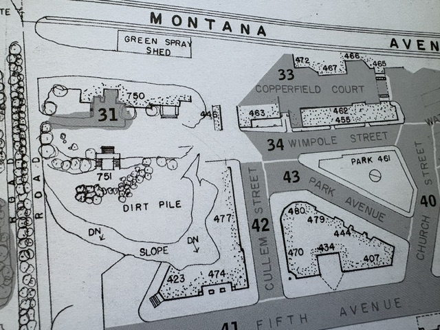A detailed map showing a residential area with labeled streets and numbered plots, including structures like 'Green Spray Shed' and 'Copperfield Court'.